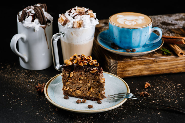 chocolate-cake-with-nuts-composition-with-coffee-drinks-black
